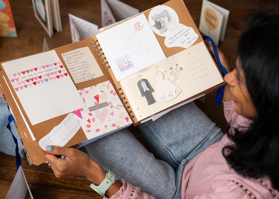 Anushka shows off her DIY scrapbook of cards she's received