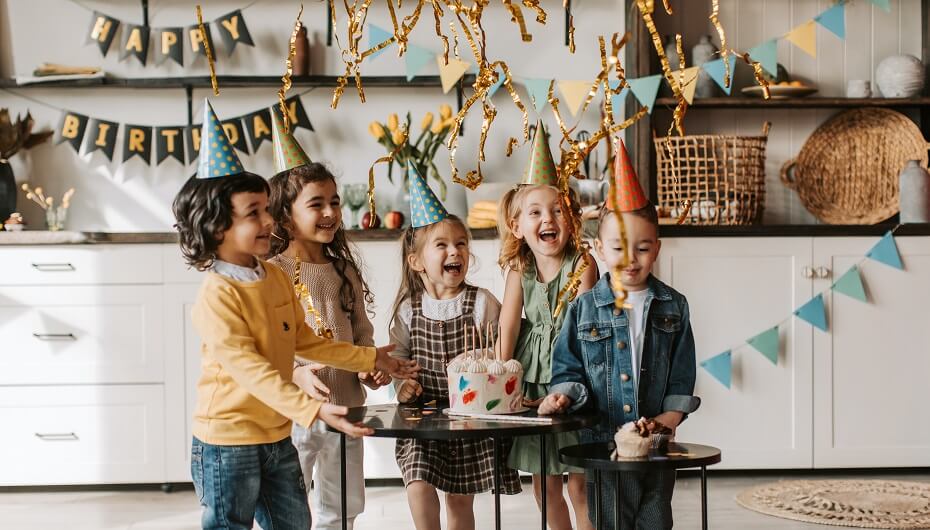 children celebrating kids party with cake