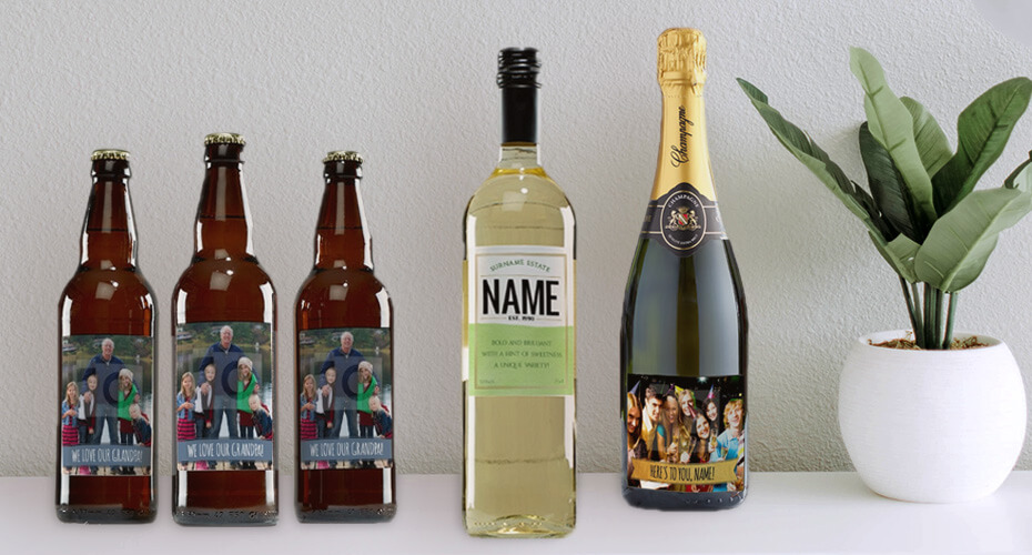 a selection of alcohol bottles with personalised labels as wedding gifts