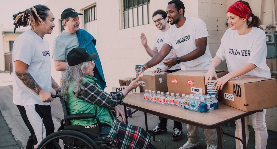 charity volunteers handing out water