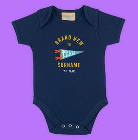 Photo of New To Team Surname Personalised Baby Grow