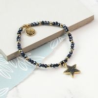 Black Crystal Star With Gold Chain Bracelet